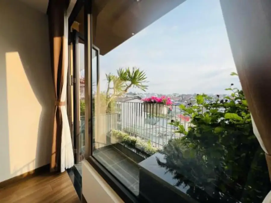A bedroom with a balcony over the city, Cozy Garden — A flat at Cozy Garden — long let, Da Lat