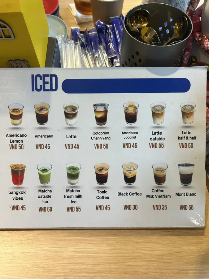 The iced drinks menu with prices — dhc Coffee Lab — latte art and a barista school, Da Lat