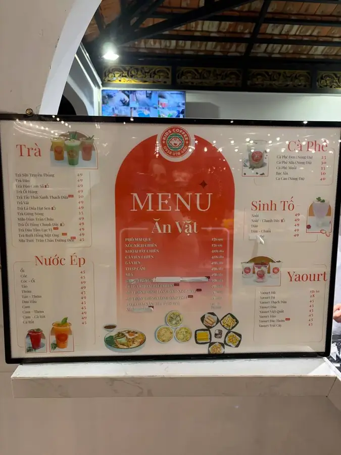 The menu: coffee, tea, juices and children snacks with prices — Kids Coffee — an indoor play room with a cafe, Da Lat