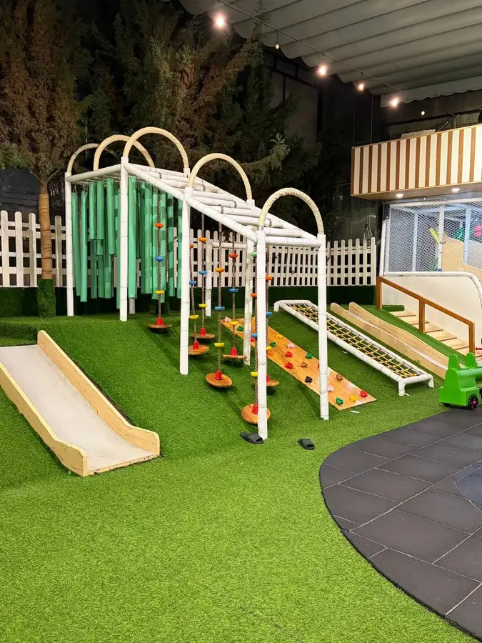 The rope obstacle course on artificial grass, Kids Coffee — Kids Coffee — an indoor play room with a cafe, Da Lat