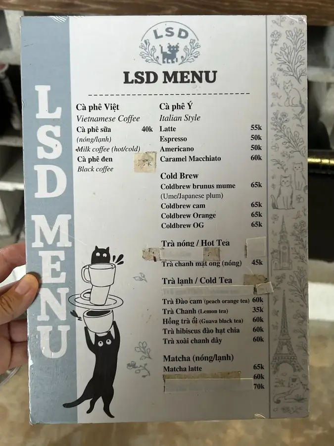 The LSD menu: coffee, cold brew, tea and matcha with prices — LSD Coffee Mèo — a cat cafe with a valley view, Da Lat
