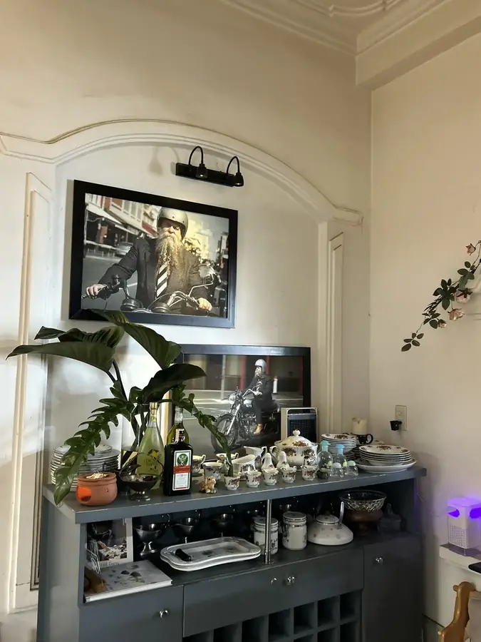 The coffee sideboard with cups in the lower room — Moto Laurie — breakfasts and a vegan menu over the city, Da Lat