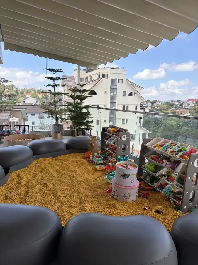 The kids' area with toys on the terrace — Suoi May Onsen & Spa — Japanese baths looking into the pines, Da Lat