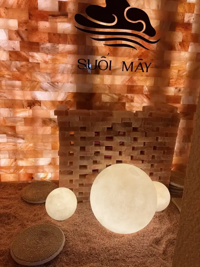 The salt wall and glowing globes in the rest room — Suoi May Onsen & Spa — Japanese baths looking into the pines, Da Lat