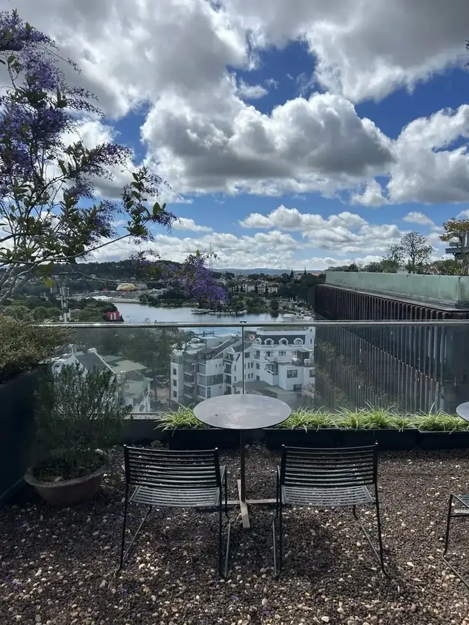 The rooftop terrace at Thô’s Artisan Coffee with a view over Da Lat