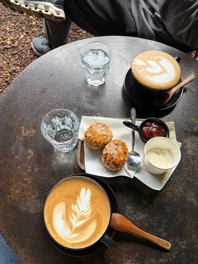 Cappuccino and scones with jam and cream at Thô’s, Da Lat