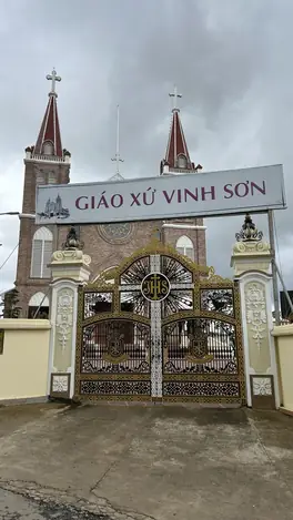 Vinh Son church — brick neo-Gothic with stained glass in Cam Ly, Da Lat